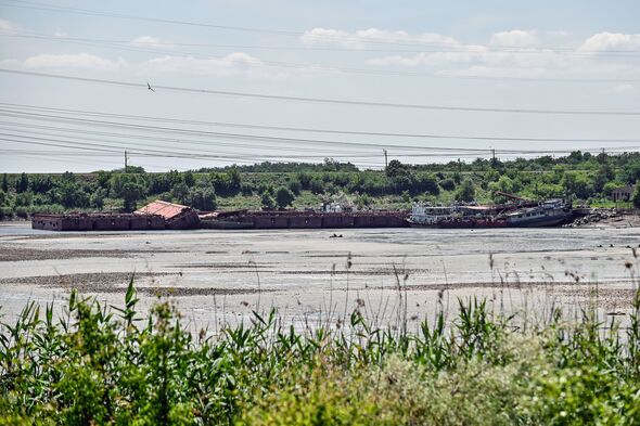 Skulls 'uncovered' in reservoir after being drained following Ukraine dam breach