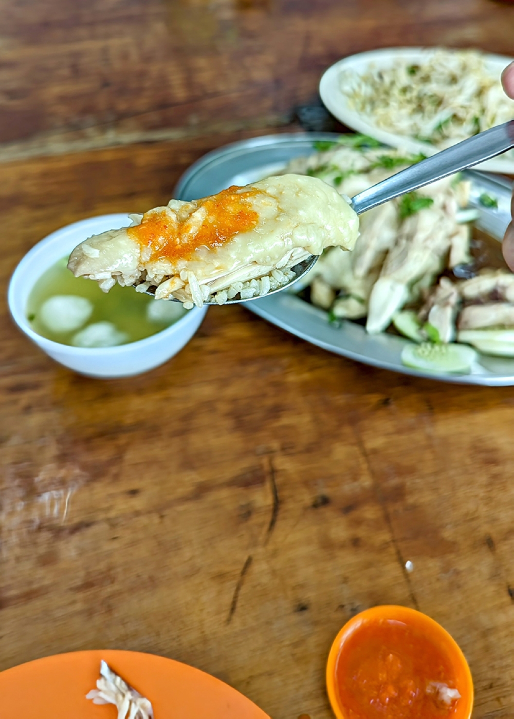 At Nasi Ayam Sungai Buloh, find great poached chicken rice and the bean sprouts that threaten to upstage it