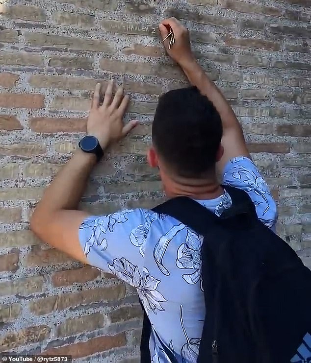 EXCLUSIVE: 'Ivan and Hayley' revealed! Tourist who carved his name into Colosseum wall is a fitness instructor who lives in Bristol (and Italian police would like to have a word with him…)