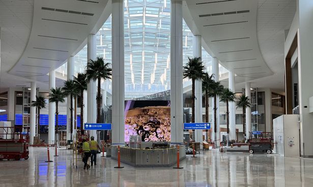 Fight breaks out at Orlando International Airport as man puts cop in chokehold