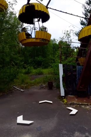 Ghostly figure spotted lurking at Chernobyl's abandoned fairground goes viral