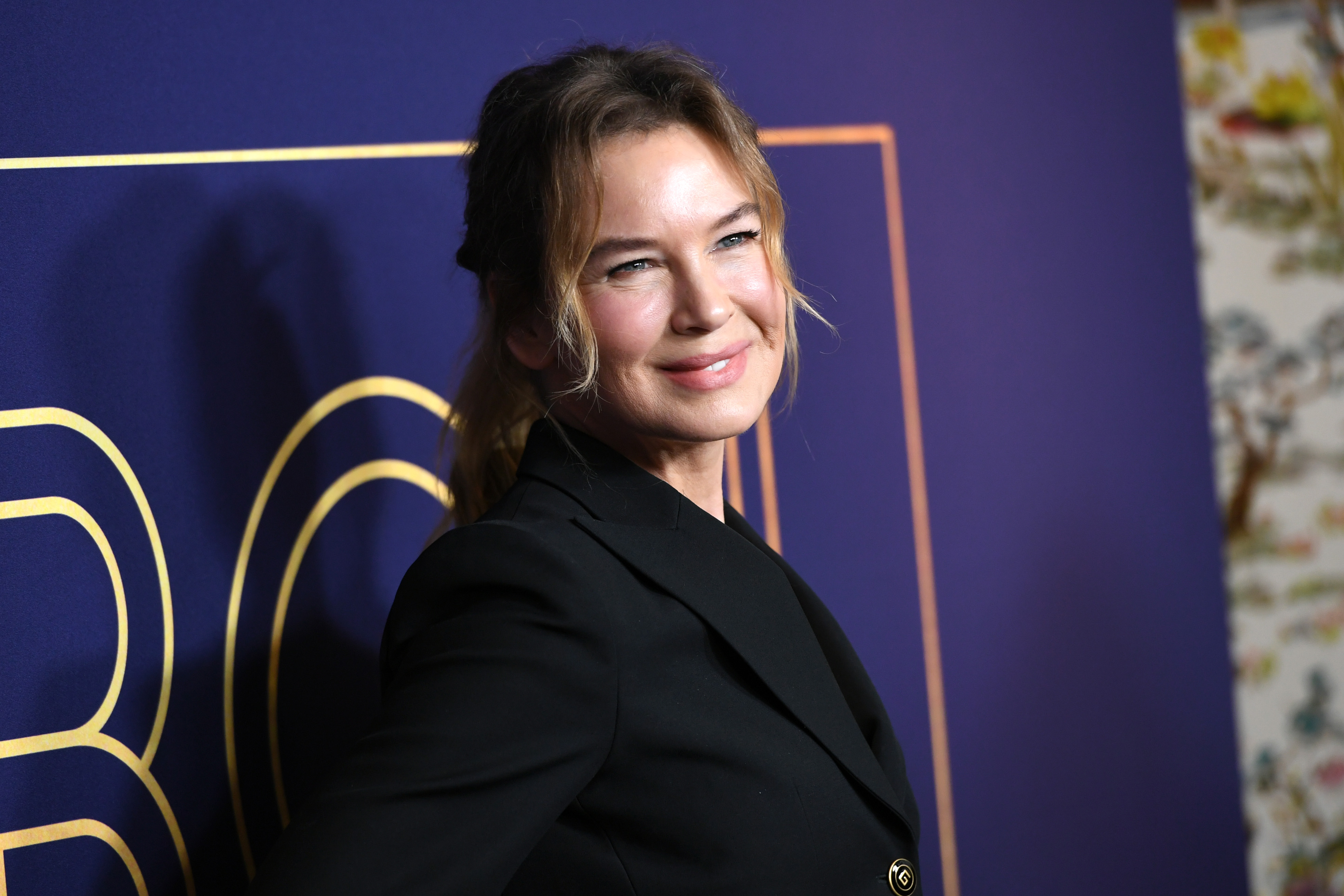 Renee Zellweger beams as she poses with partner Ant Anstead’s teenage kids for first time