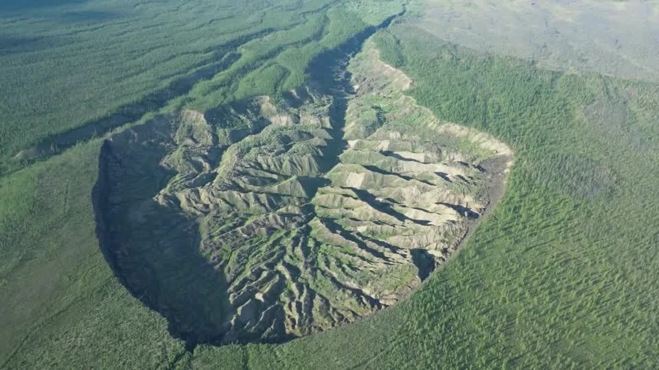 The World's biggest permafrost crater is growing