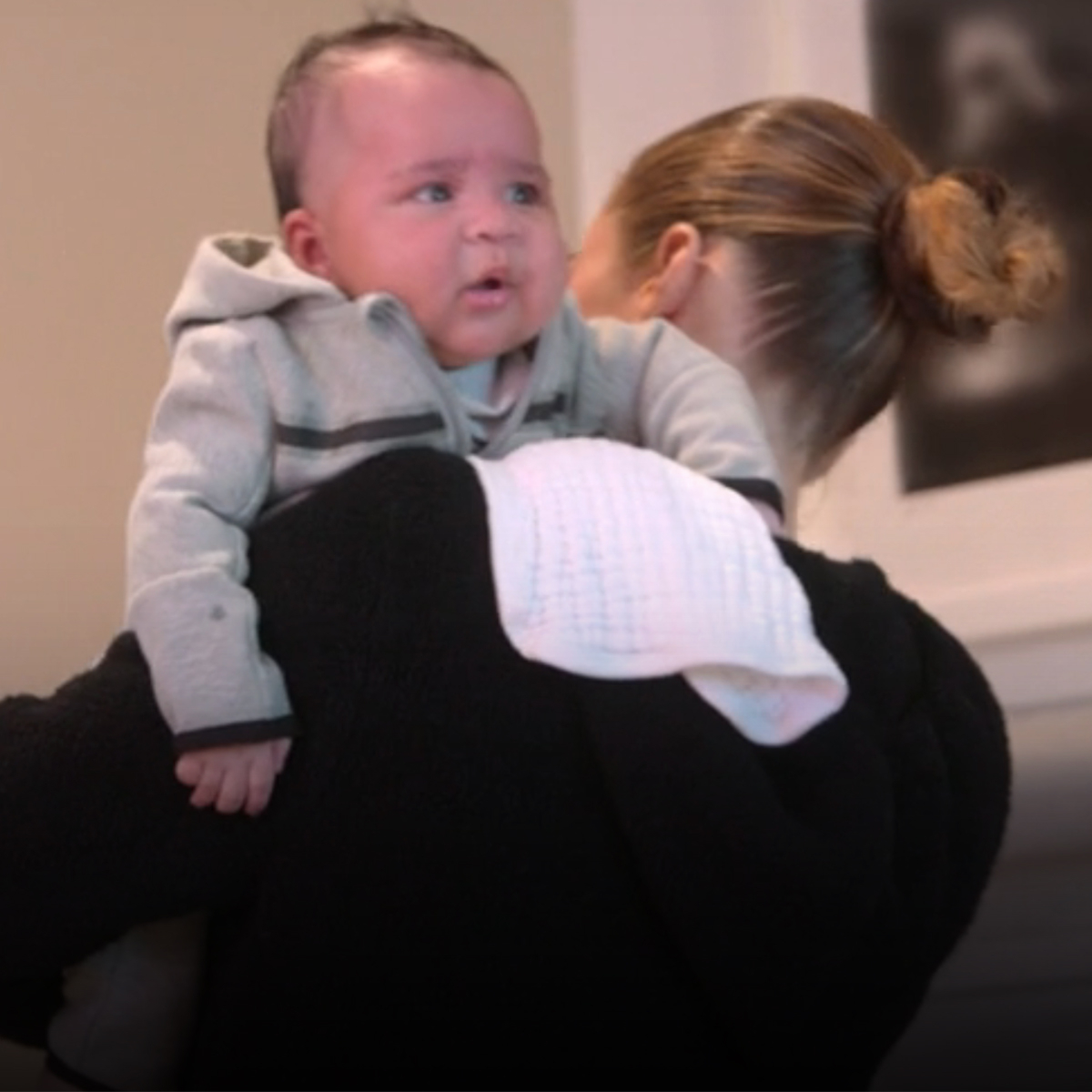 See Khloe Kardashian and Tristan Thompson Cuddle Baby Boy Tatum After Moving in Together