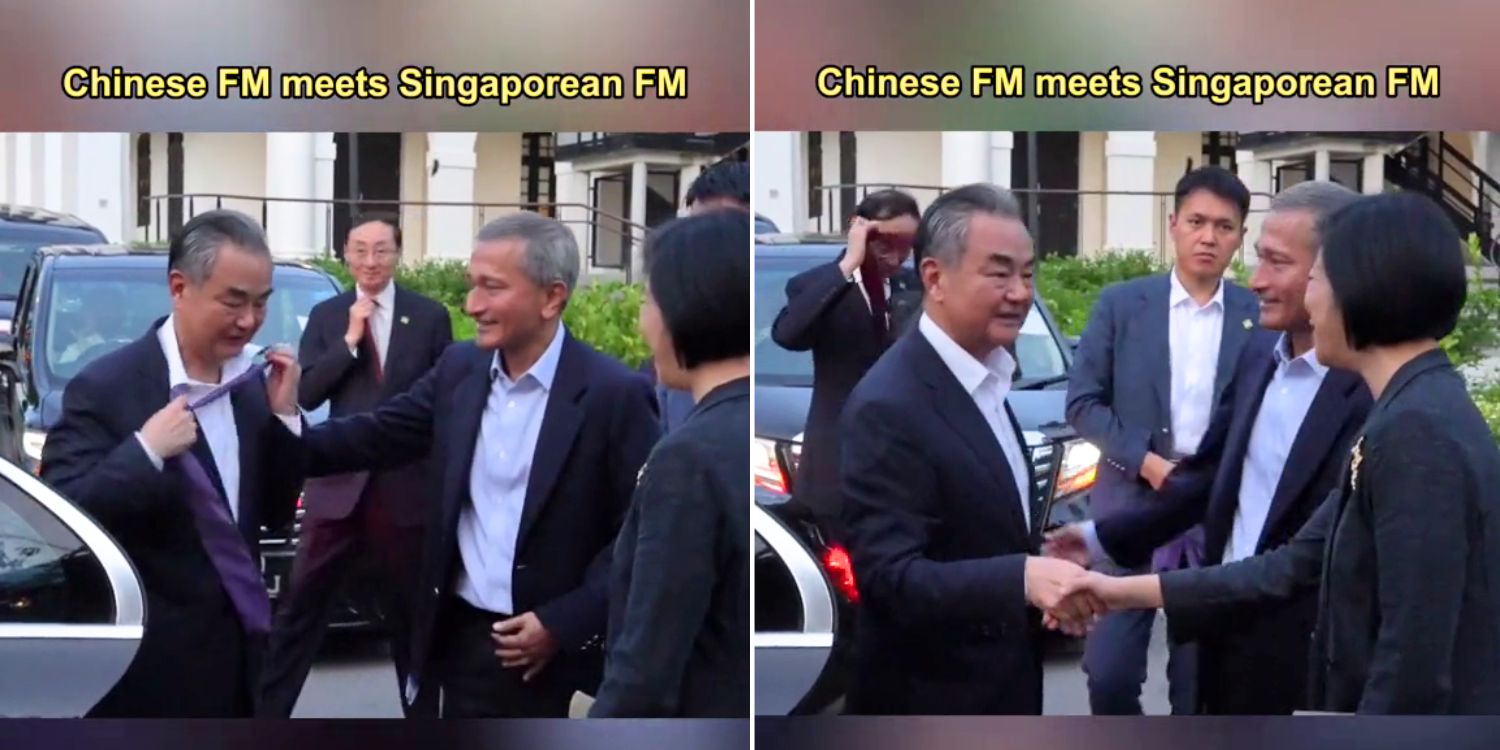 China’s foreign minister Wang Yi removes his tie after seeing Vivian Balakrishnan without one