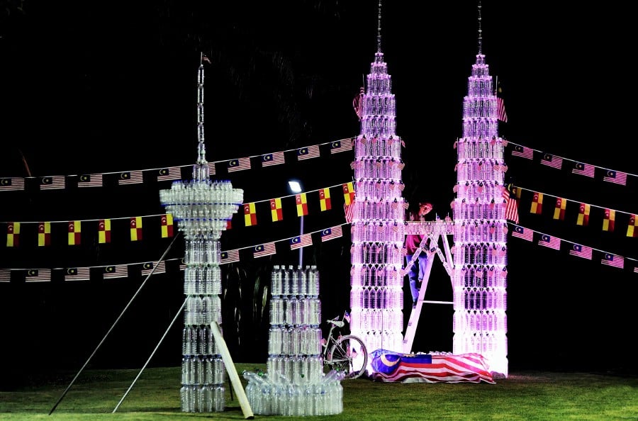 Boy builds towering replica of KLCC in Tanjong Karang
