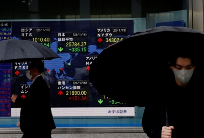 Stocks in Asia rise, yen wobbles after volatile start to week