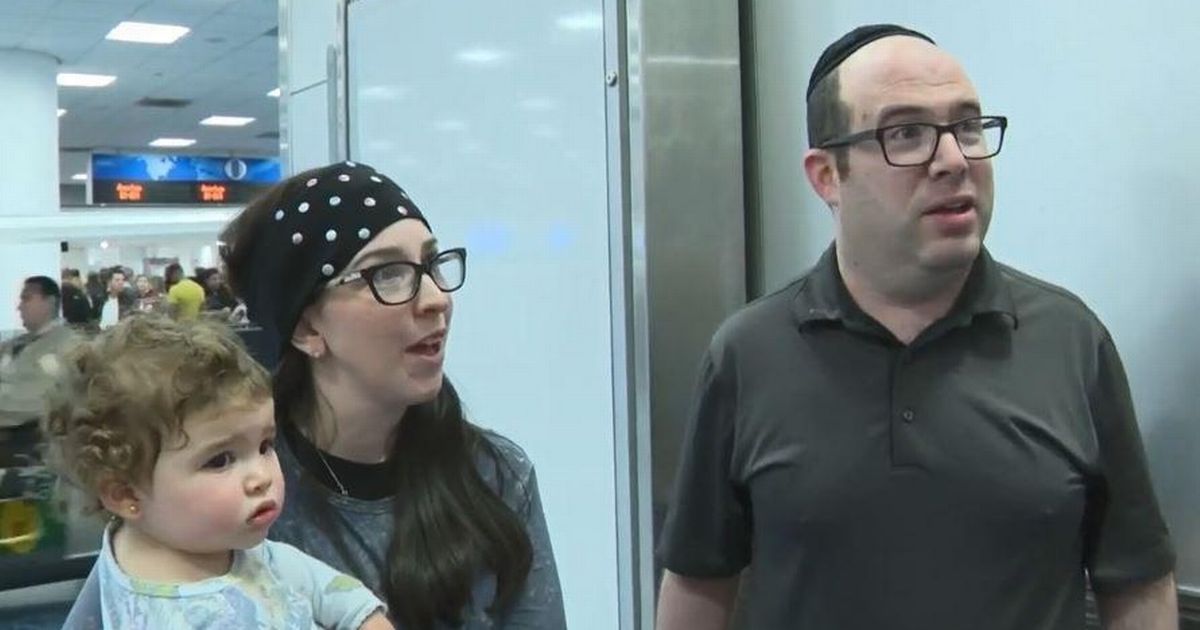 Family kicked off flight after passengers complain they 'smell' sue airline