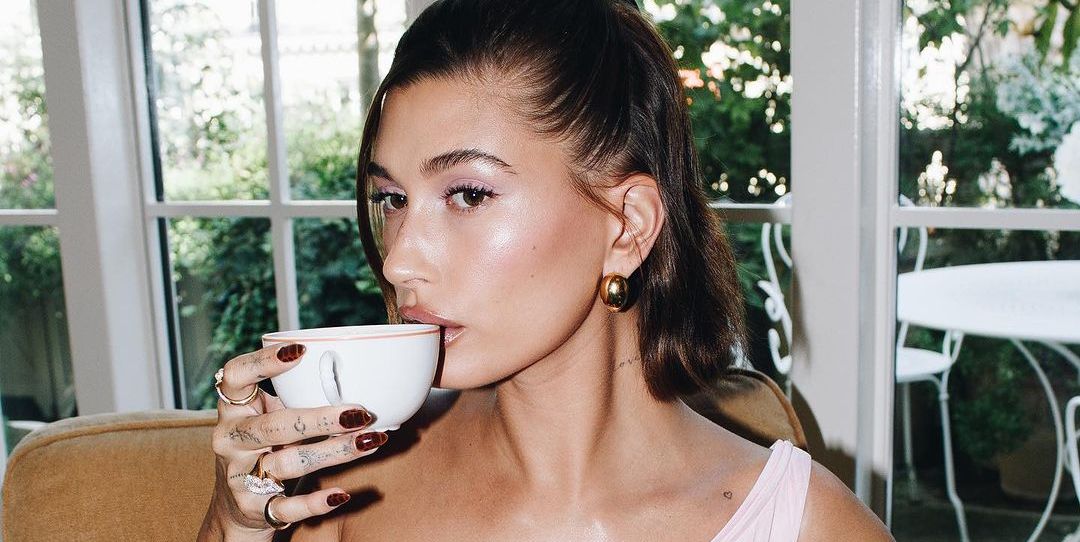 Hailey Bieber Does Balletcore in a Little Pink Dress and Flats With Socks