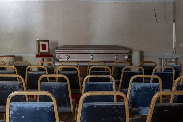 Haunting pictures show abandoned funeral home with creepy embalmed head in cabinet