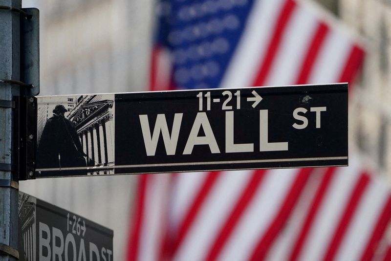 Wall St ends sharply lower on sticky inflation