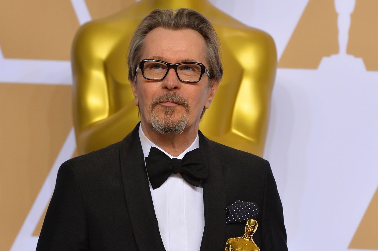 Gary Oldman says roles in 'Batman' and 'Harry Potter' movies 'saved' him as a dad