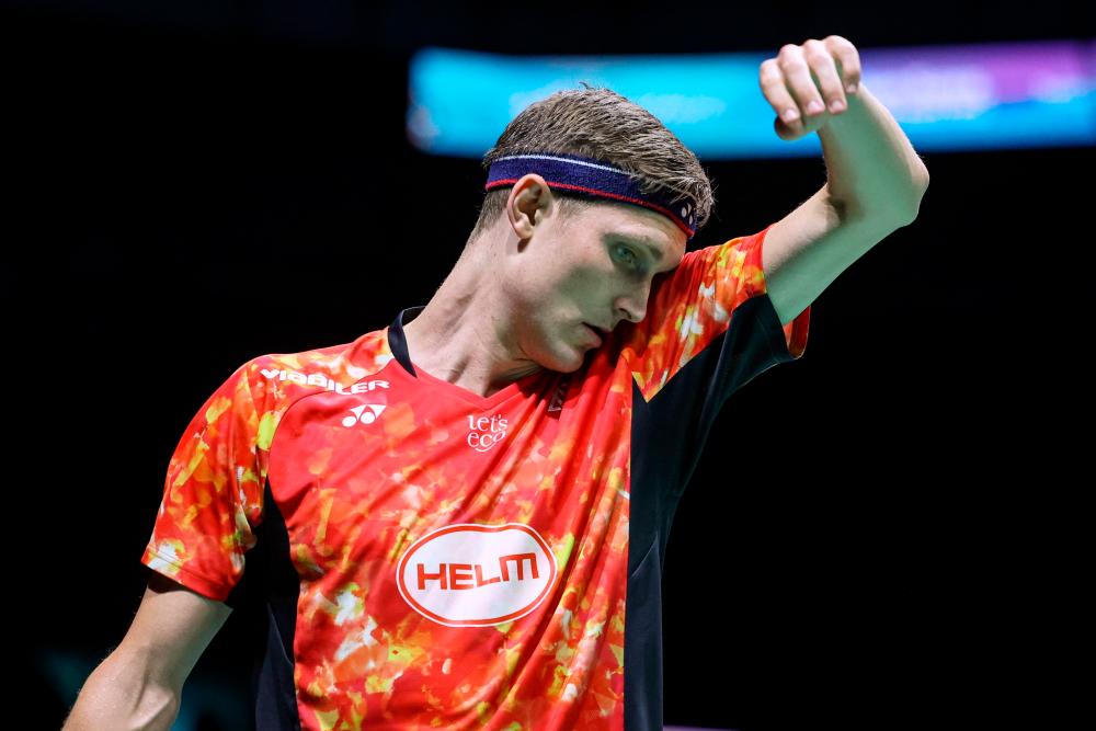 Top seed Axelsen crashes out of All England Open