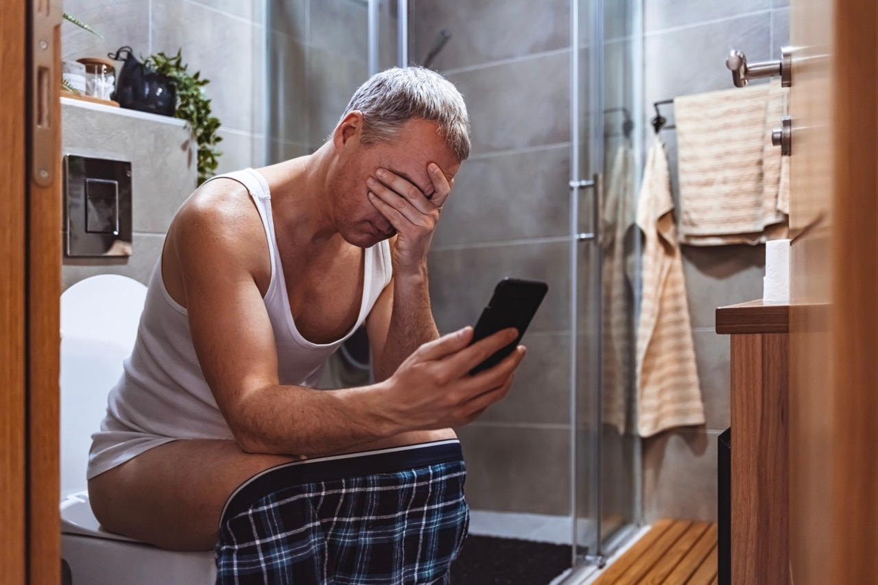 Doctor issues warning over using your phone while on the toilet