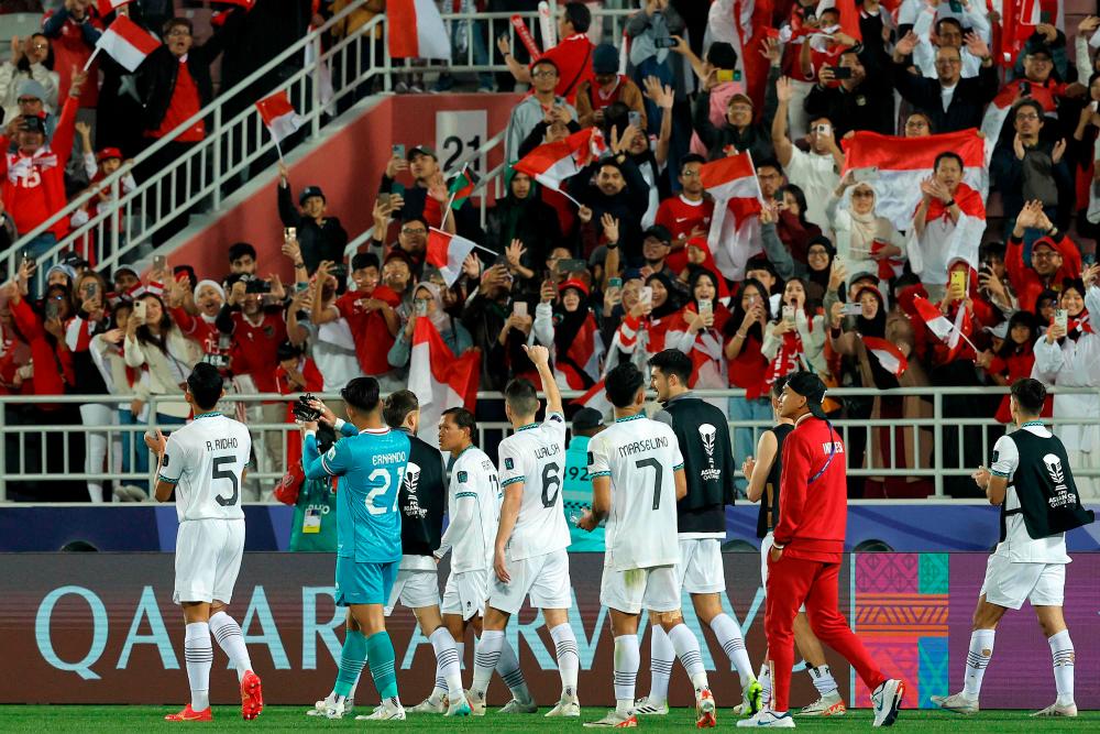 Indonesia keep hopes alive as Asnawi’s penalty sends Vietnam packing