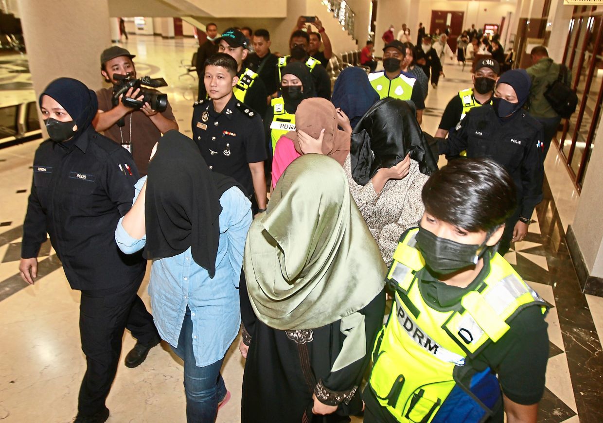 Four women fined in ‘Hot Daddy’ case, two claim trial