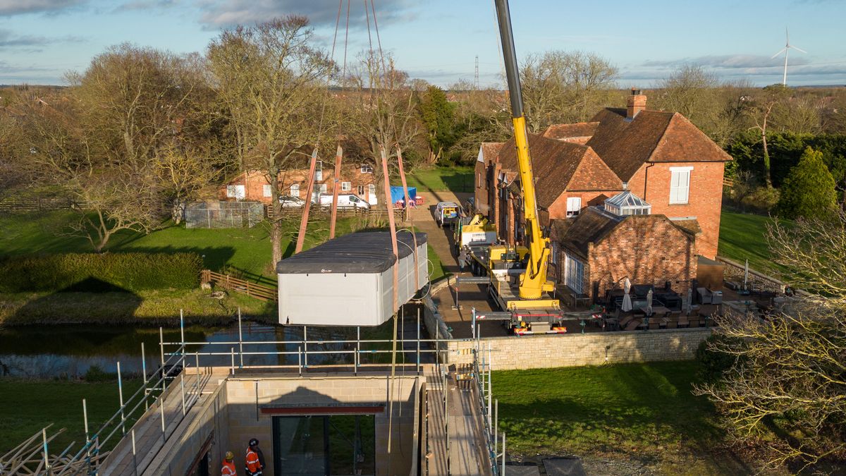 Captain Tom daughter's spa demolition continues as glass panels removed and progress inspected