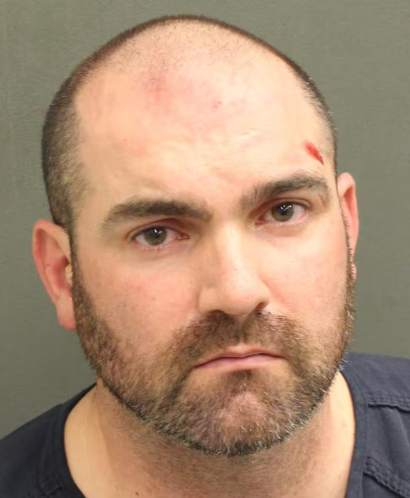 Former ‘Officer of the Year’ arrested in Disney assault after threatening ‘to f–king kill’ security guards: officials