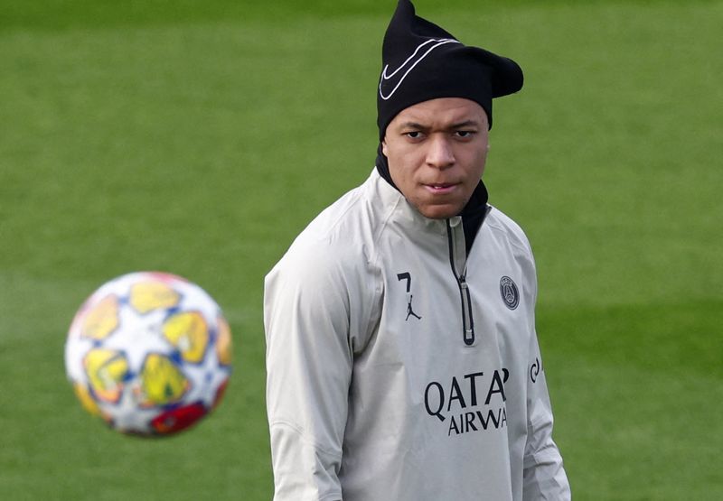 Soccer-Mbappe back for PSG Champions League tie with Real Sociedad