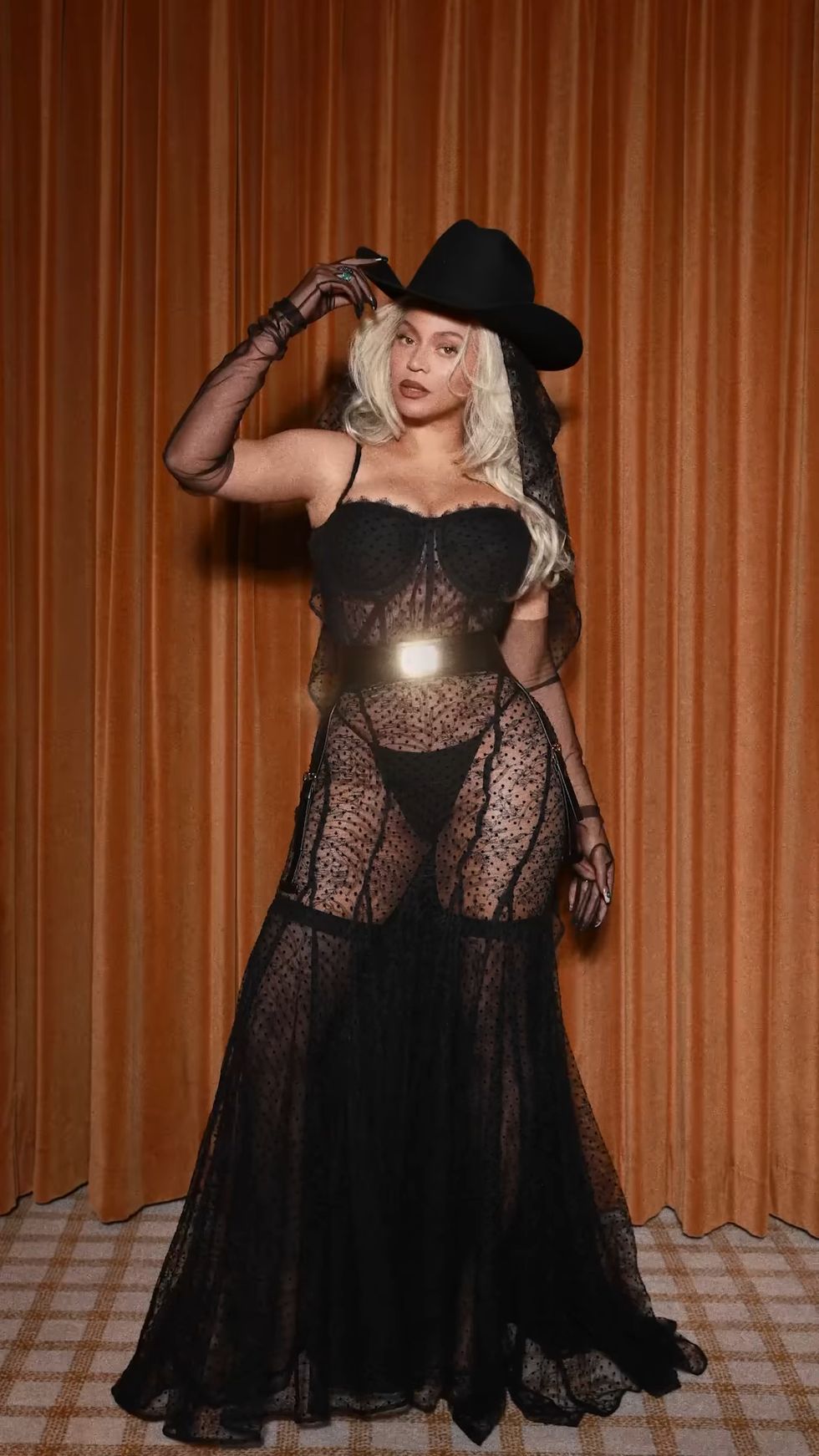 Beyoncé Rides Into Her Cowgirl Era in a Romantic See-Through Lace Dress