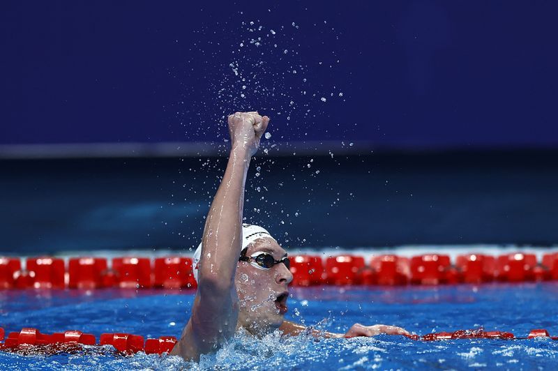Swimming-United States' Johnston top seed for 400m medley in Doha