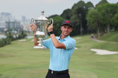 Puig clinches Malaysian Open golf title