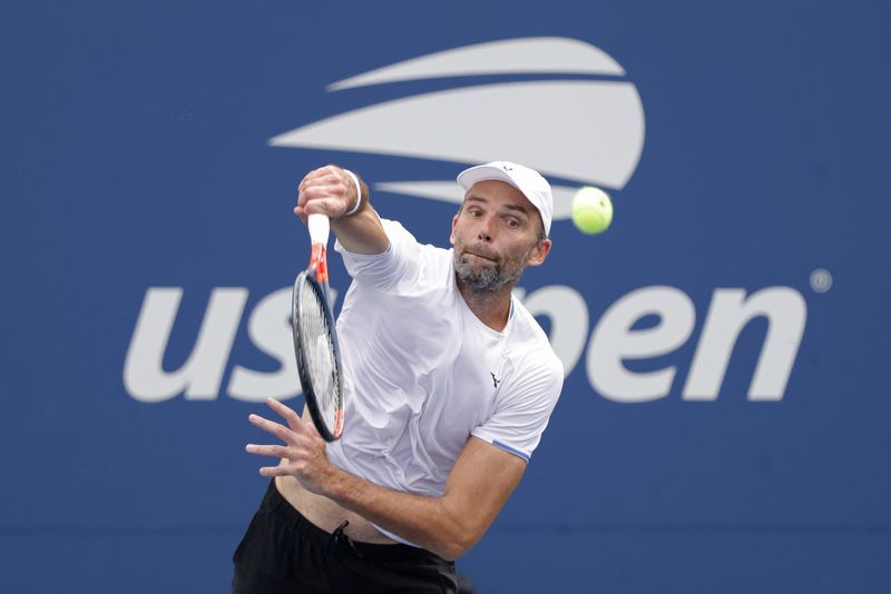 Tennis-Ace machine Karlovic calls time on 'unorthodox' career