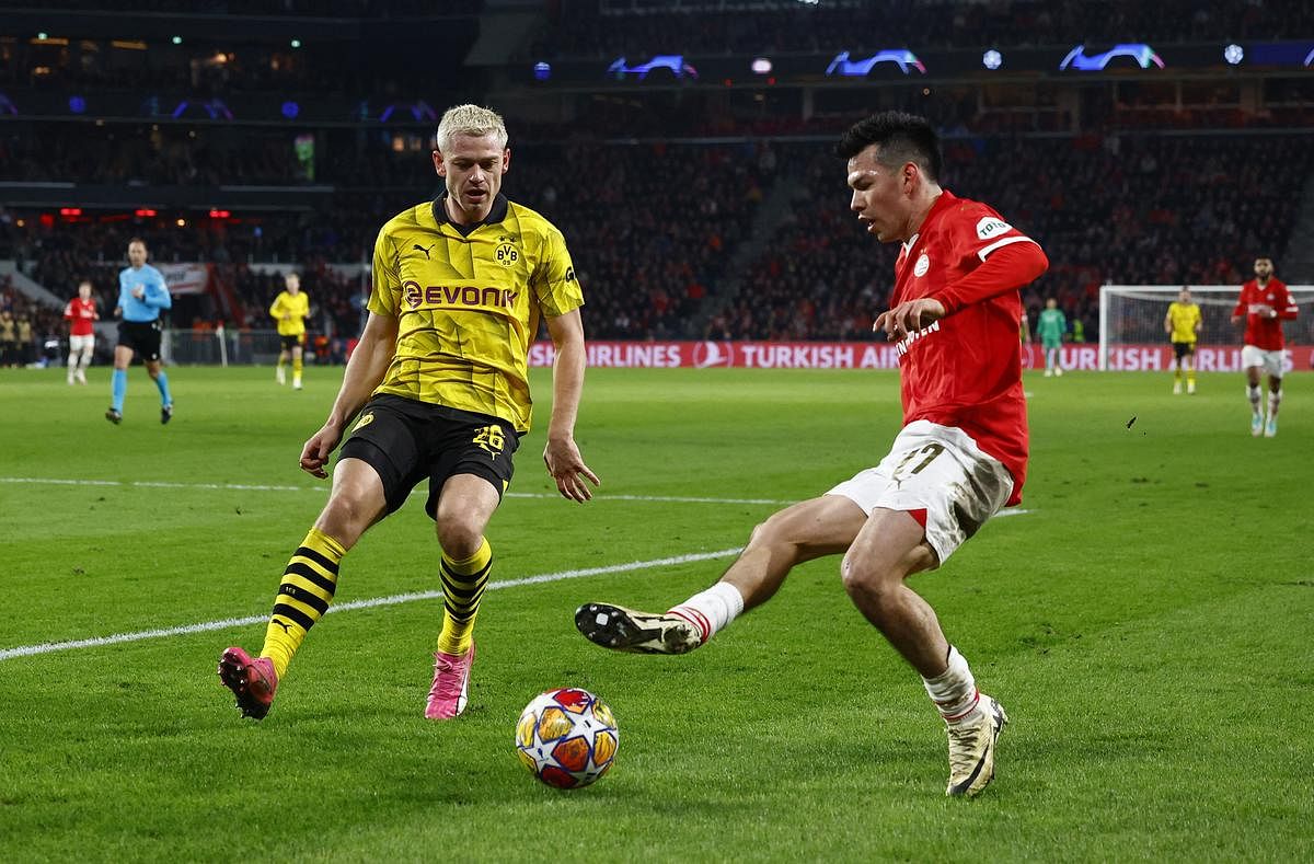 Luuk de Jong penalty earns PSV draw with Dortmund in Champions League last-16