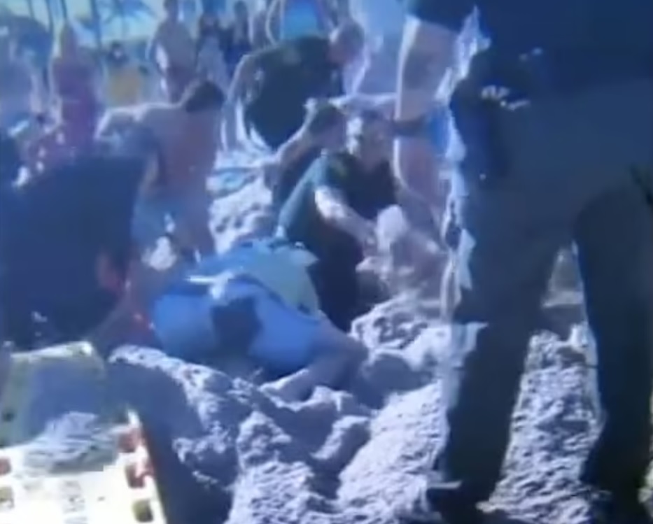 Seven-year-old girl dies after being buried alive in sand hole she was digging at beach