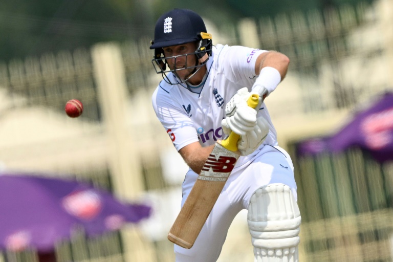 Root's patient ton helps England to 302-7 after early wickets