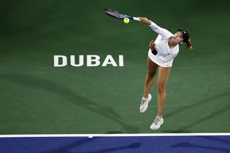 Tennis-Kalinskaya shocks Swiatek in Dubai to book final with Paolini