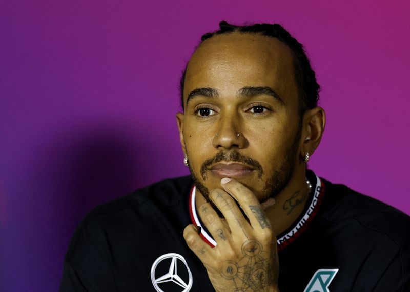 Motor racing-Hamilton says Ferrari will be a new chapter in his F1 story