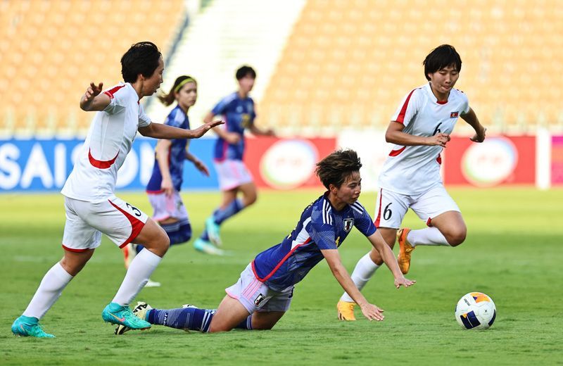 Soccer-Olympic berth in balance as North Korea hold Japan to draw