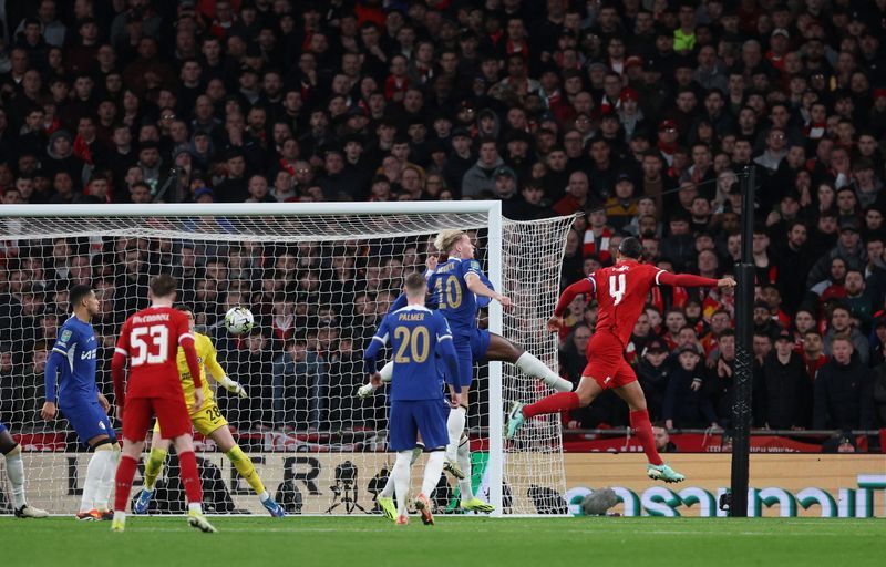 Soccer-Liverpool claim League Cup with 1-0 extra-time victory over Chelsea
