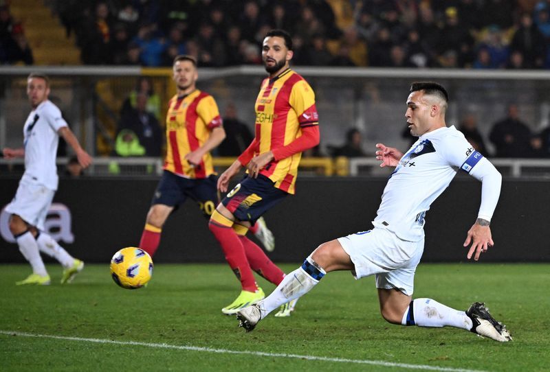 Soccer-Leaders Inter cruise to 4-0 win at Lecce with Martinez double
