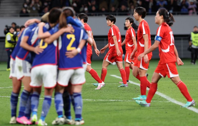 Soccer-Japan seal Olympic qualification with victory over North Korea