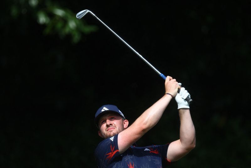 Golf-Britons Brown, Syme lead SDC Championship by two shots