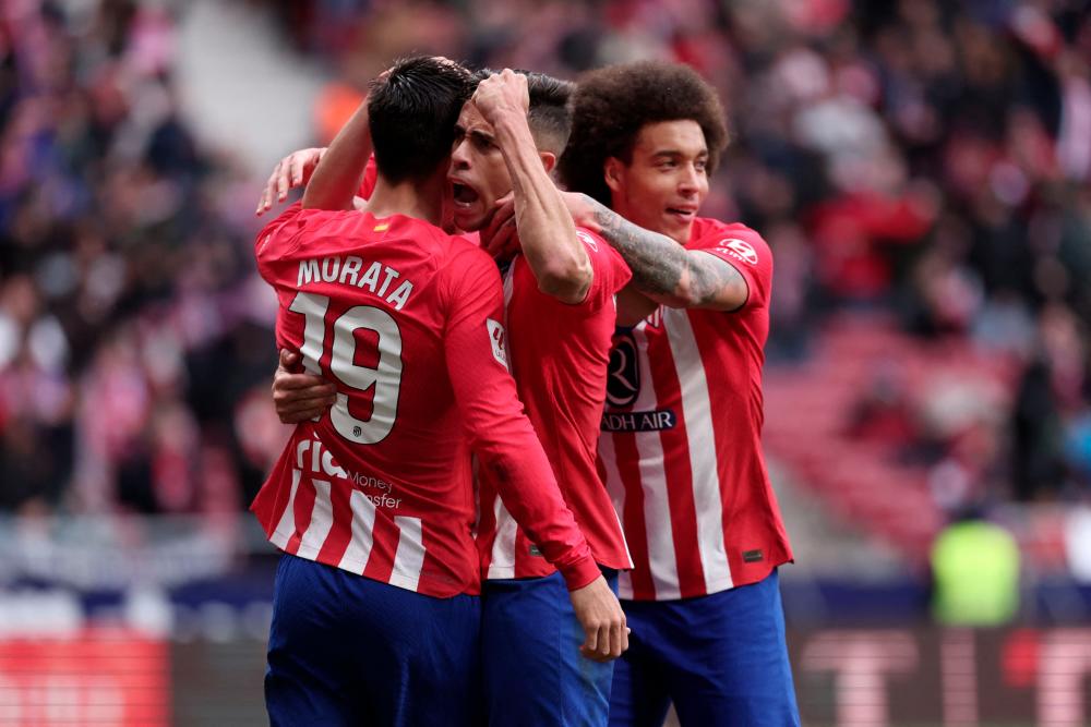 Atletico edge Betis to end slide and stay fourth in Liga