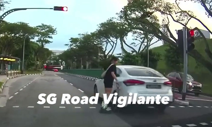 Car running red light in Bedok narrowly misses hitting girl on rollerblades by inches