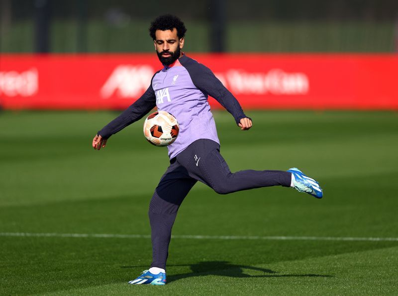 Soccer-Liverpool's Salah returns to training after two-week absence with hamstring injury
