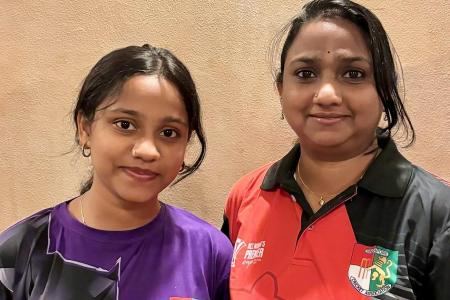 Mother and daughter bat for Singapore