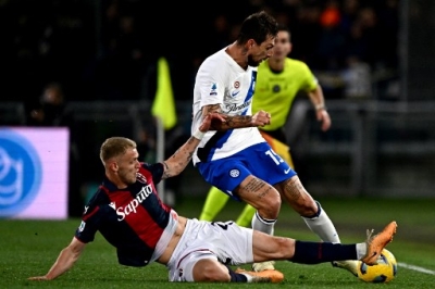 Inter continue Scudetto march at battling Bologna