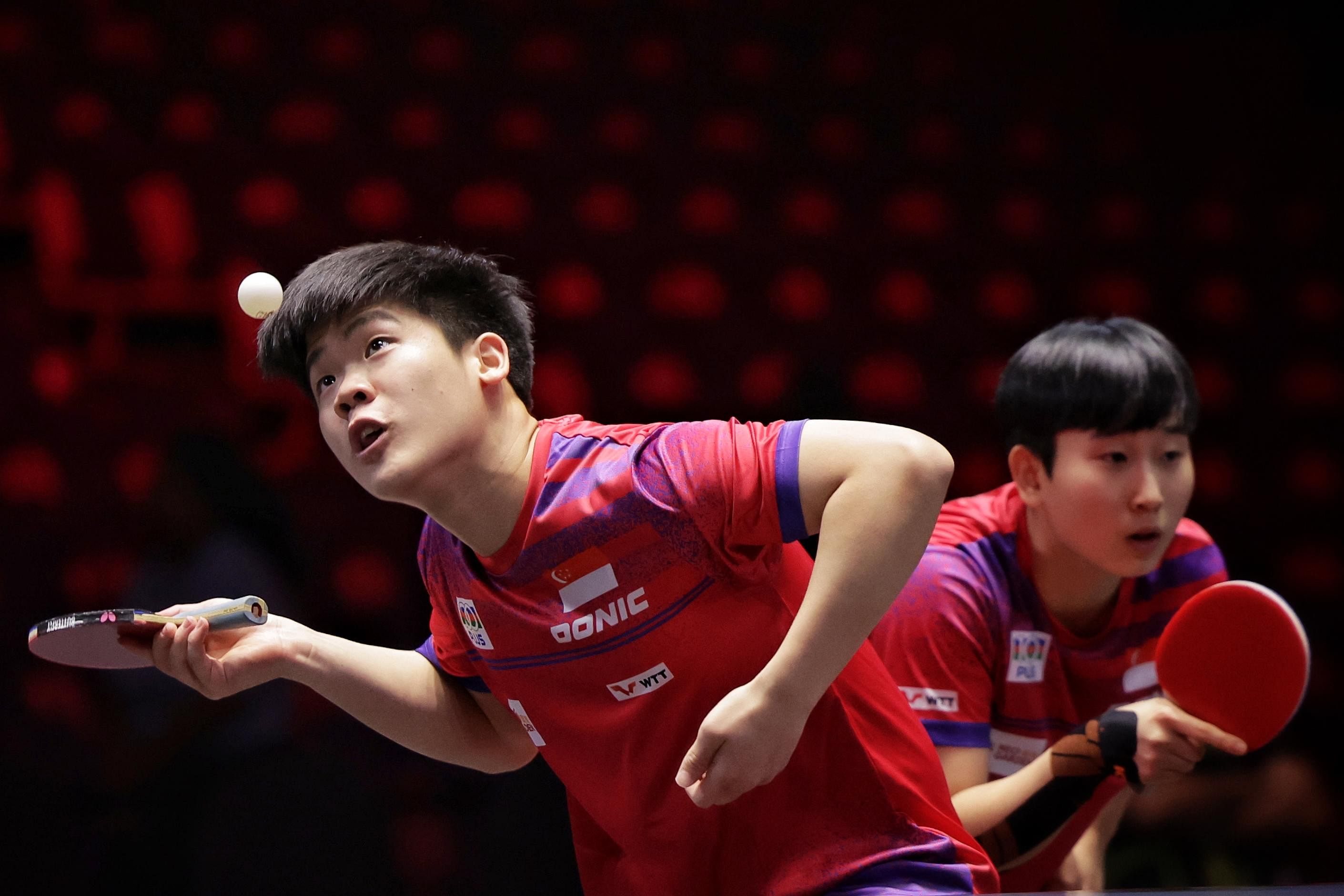 Izaac Quek and Zhou Jingyi advance in Singapore Smash