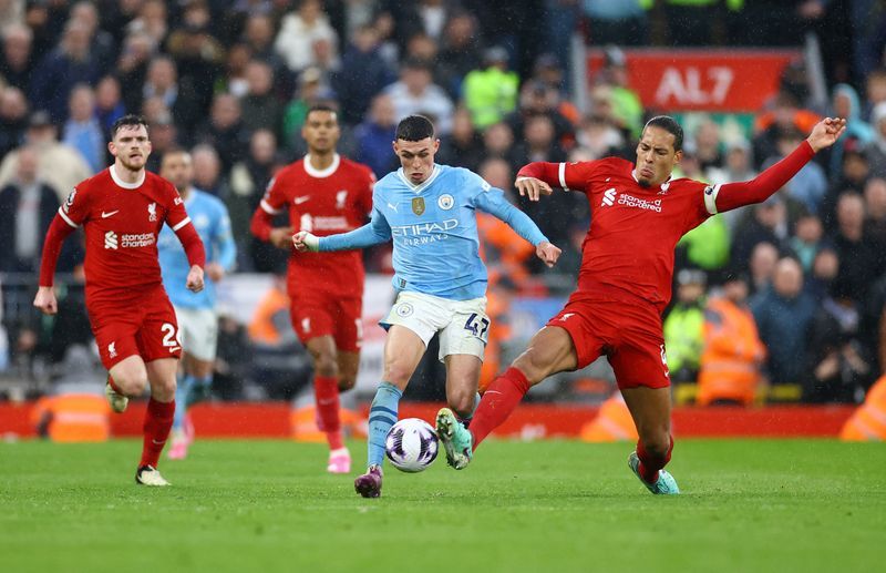 Soccer-Mac Allister penalty earns 1-1 draw for Liverpool in Man City thriller