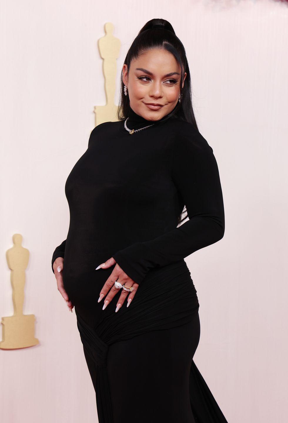 Vanessa Hudgens Announces Her Pregnancy in a Bodycon Dress at the 2024 Oscars