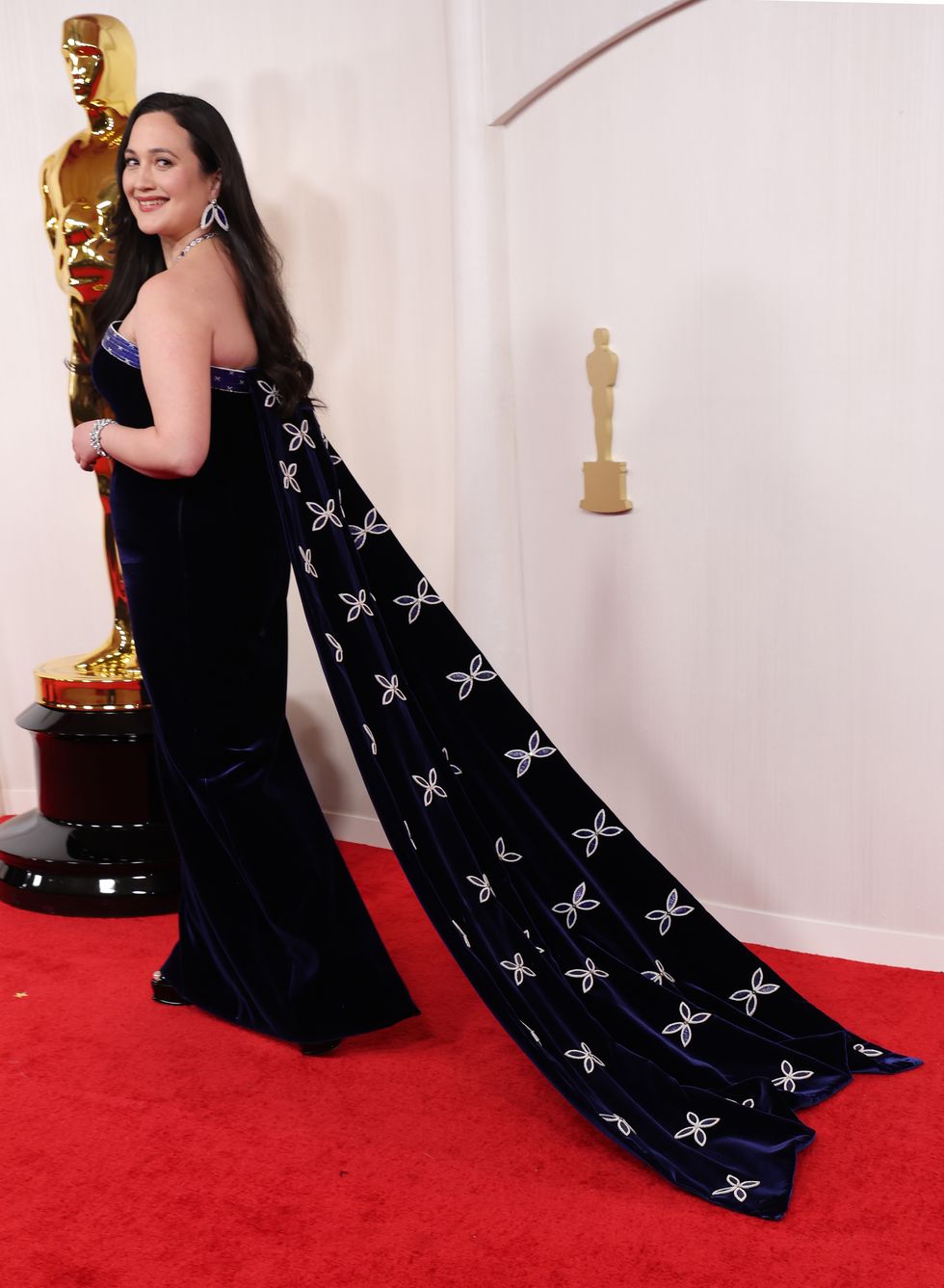 Lily Gladstone Exudes Movie-Star Glamour in Velvet Cape Gown at the 2024 Oscars