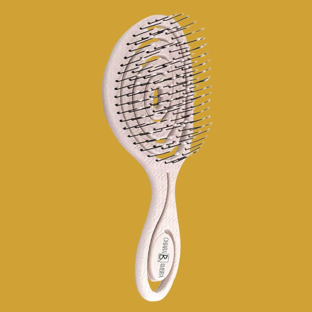 Curly-Haired Reviewers Say These Brushes "Glide" Through Hair "Like Butter"