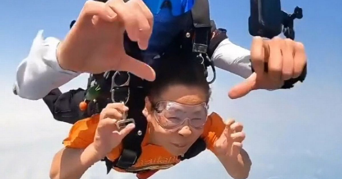 Gran fulfils her wish to jump out of a helicopter at age 70 on skydiving adventure
