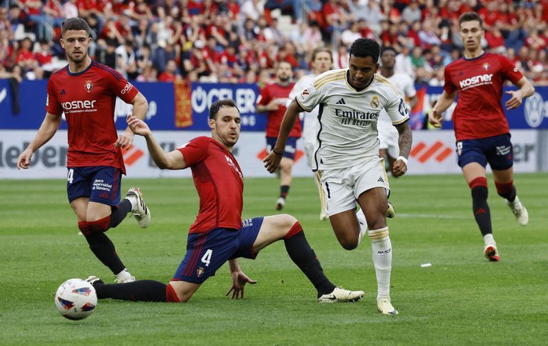 Soccer-Dominant Real Madrid claim 4-2 win at Osasuna with Vinicius Jr brace