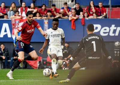 ‘Extraordinary’ Vinicius hits brace as Madrid distance Girona